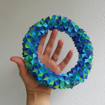 Knotology Torus, torus made from paper strips by knotology.  