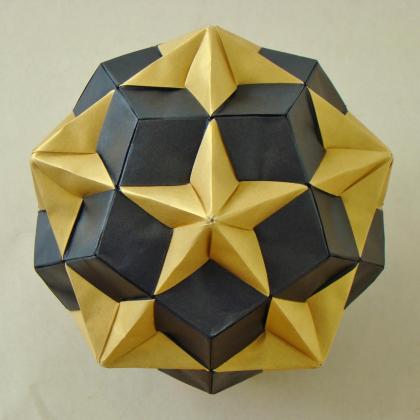 Compound of Dodecahedron and Great Dodecahedron.  Designed and folded by James Lucas from 120 uncut squares of Stardream paper.