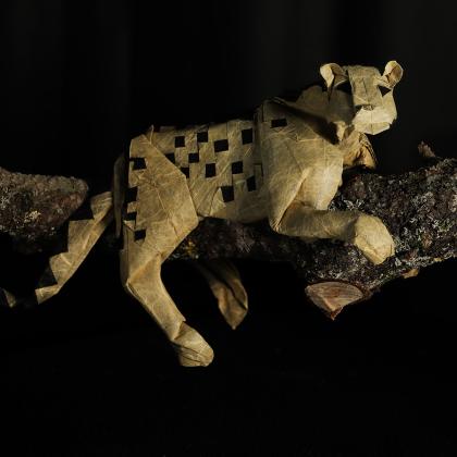 Jaguar folded from a single square sheet of paper, natural color changes