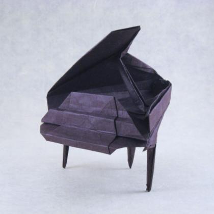 “Baby Grand Piano” folded and photographed by Gilad Aharoni - diagrams available in various forms / sources including BOS Convention 2012 Spring and Origami 4 by Robert Harbin